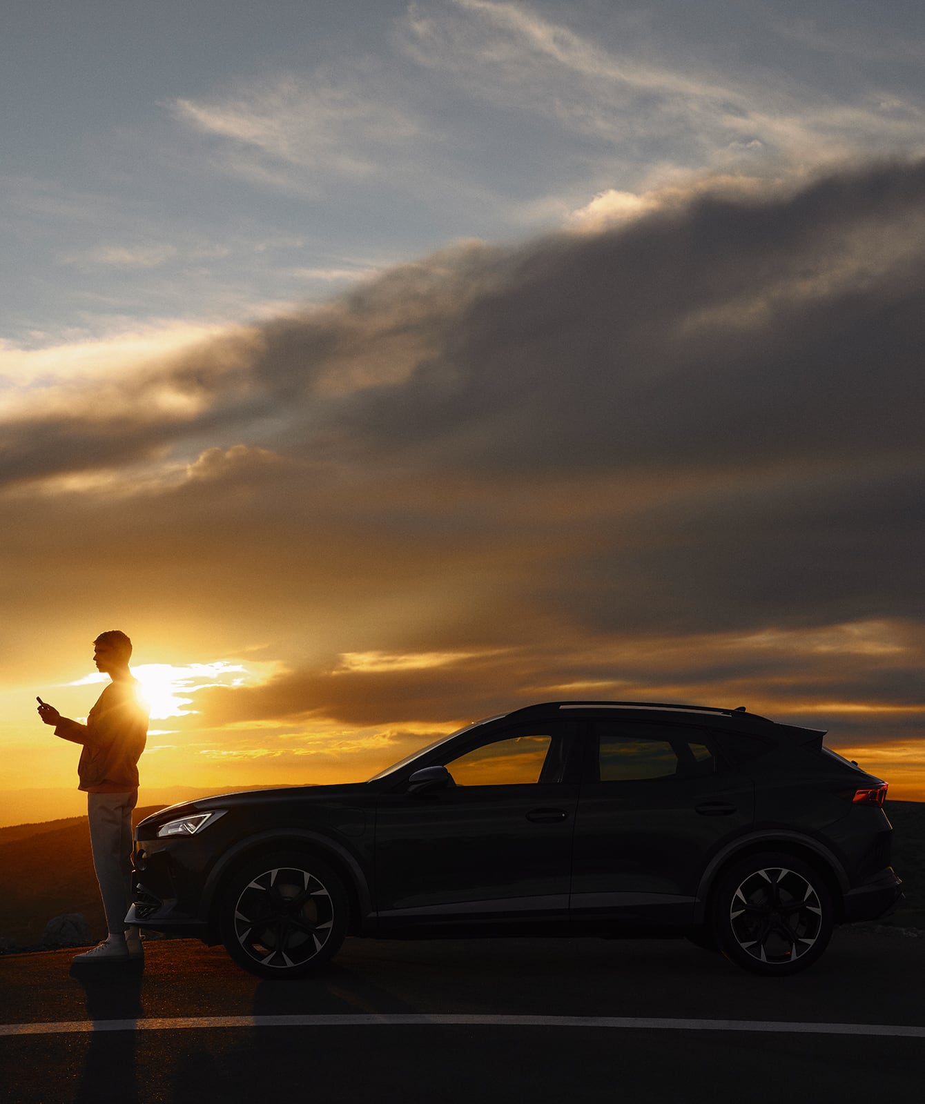 man-standing-in-front-of-formentor-with-sunset-view 